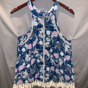 Listicle floral halter with fringe embellishment